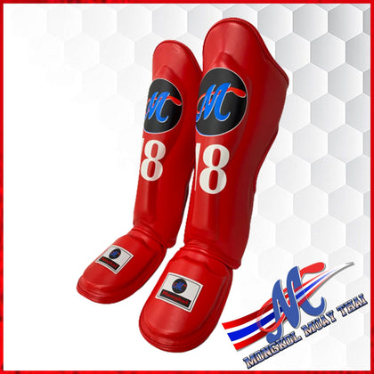 Muay Thai shin guards, They are usually made from a combination of foam, leather, and plastic, and come in a variety of sizes and styles. They are designed to reduce the risk of injury.
