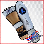 White shinguards with the Thai flag logo number 18 and Sakyan meaning luck & protect The white with Mongkol original Logo M