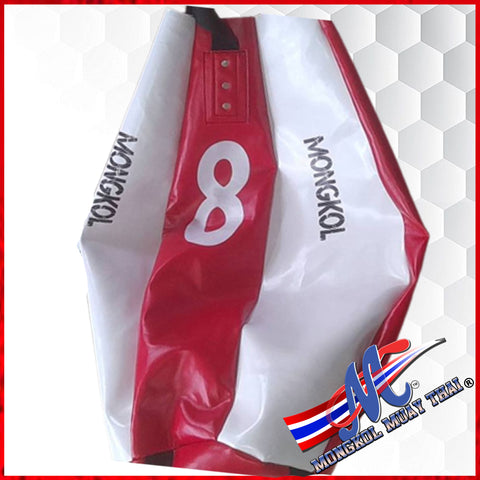Unfilled Mongkol balloon-style bag. A balloon-style muay Thai bag is a large,  punching and kicking bag designed for use in muay Tha Red and White